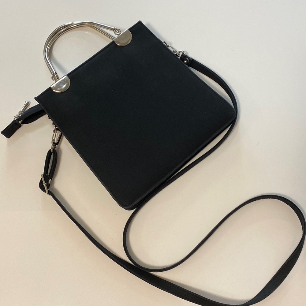 Black handbag with long strap